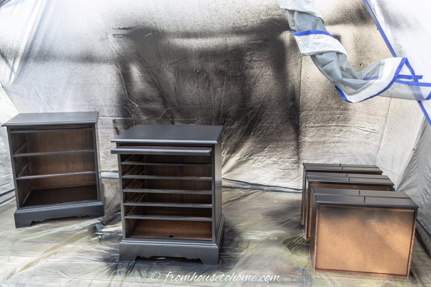 The nightstands and drawers after the first coat of latex paint