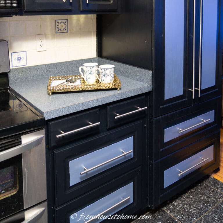 painted black and blue kitchen cabinets