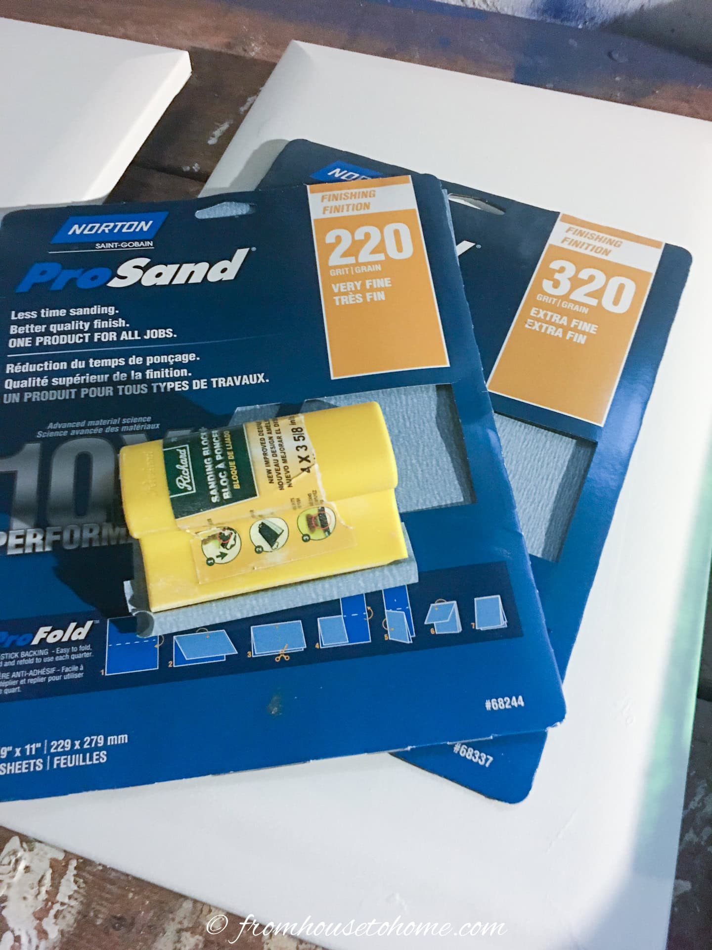 220-grit sand paper and a sanding block