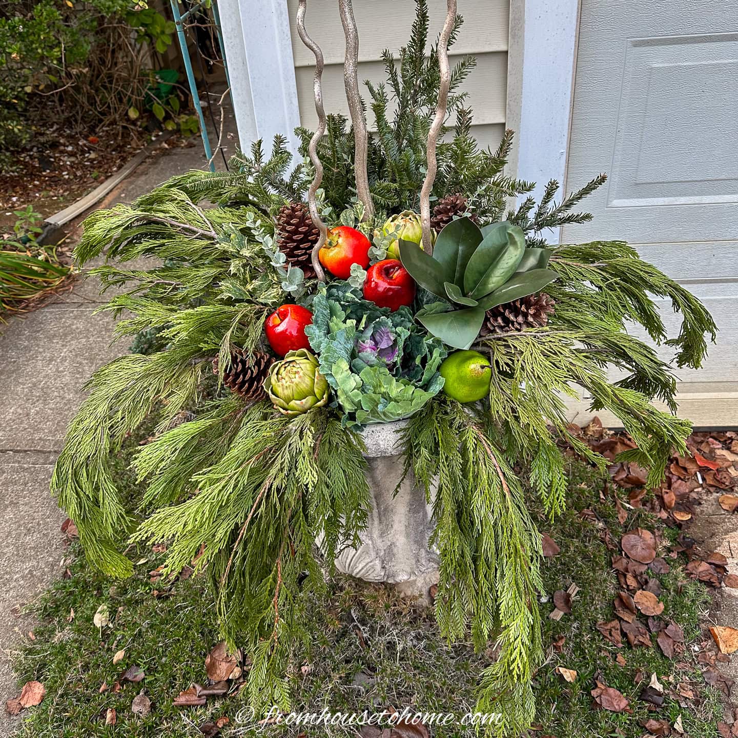 How To Make A Winter Porch Pot With Evergreens And Artificial Fruit