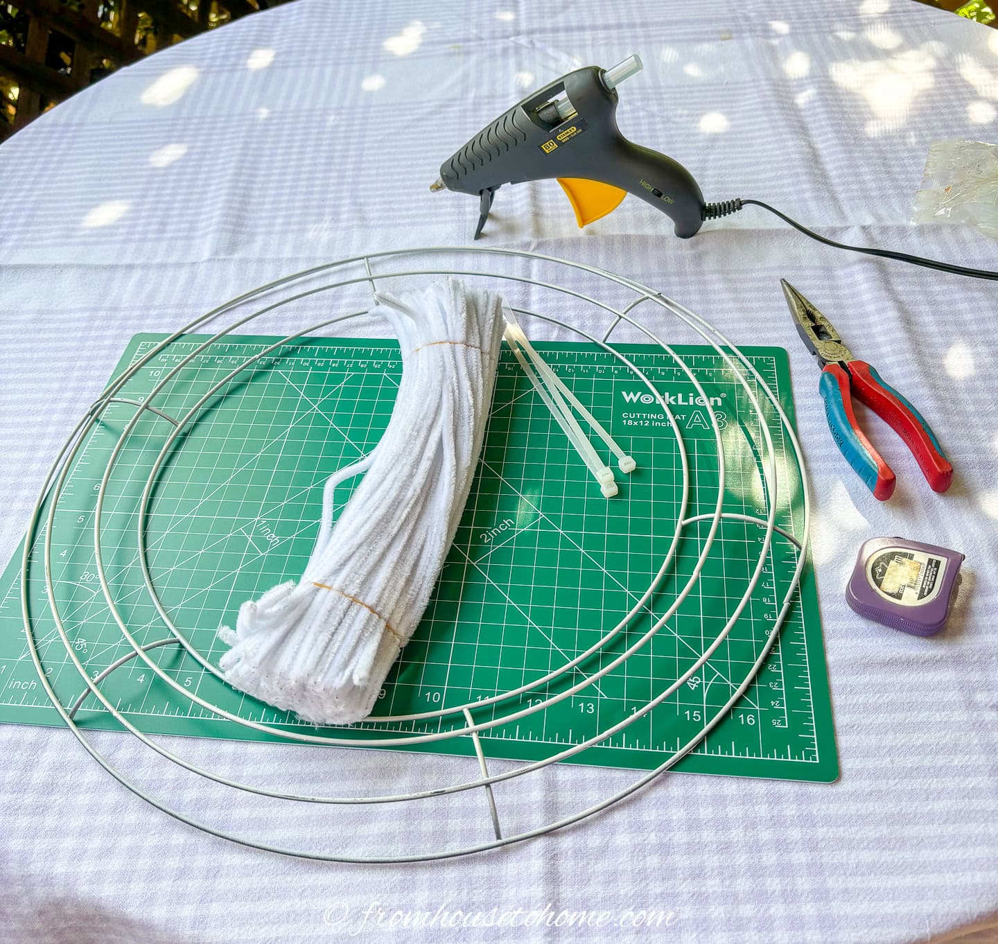 supplies attaching pipecleaners to the wire wreath form