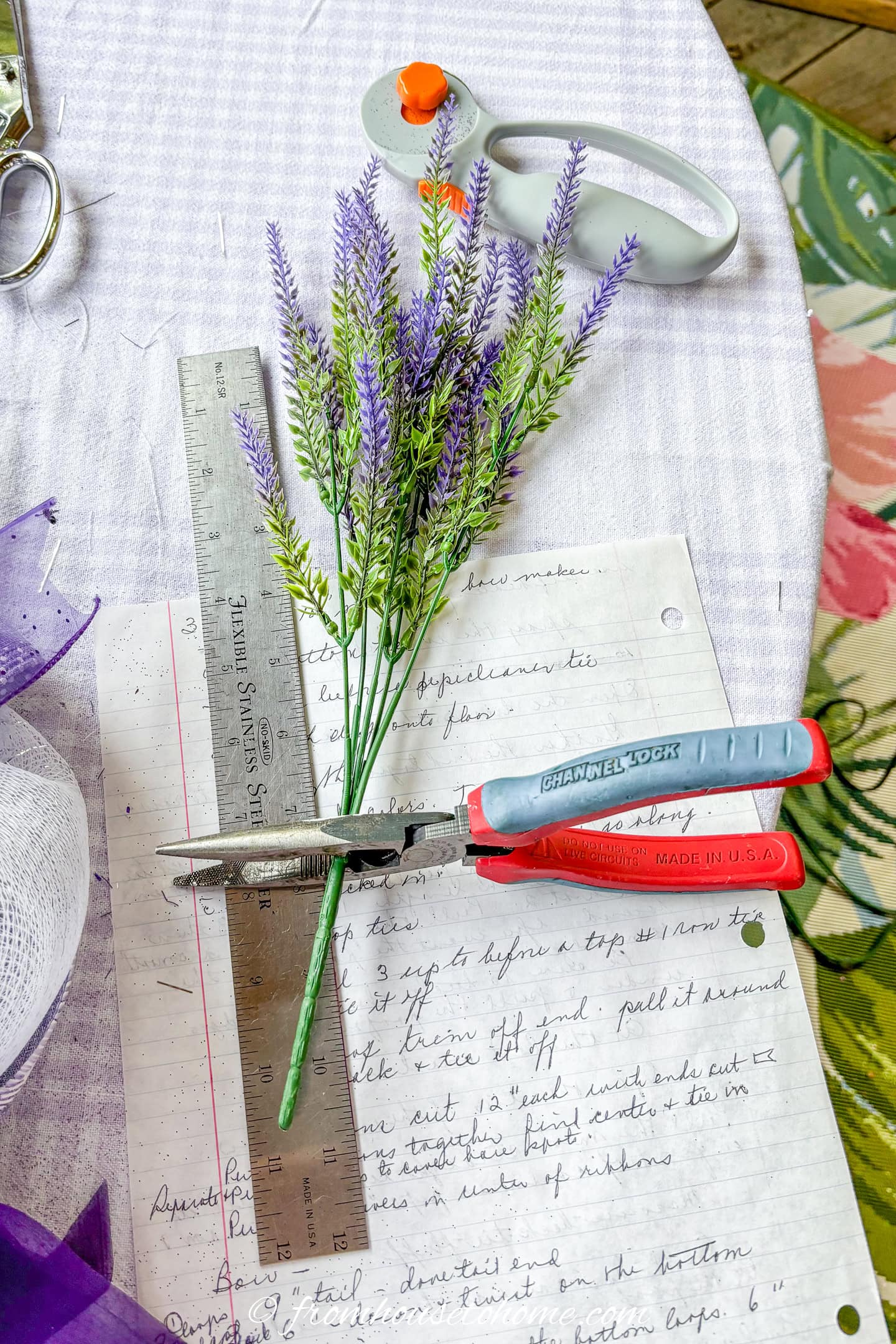 artificial lavender picks being shortened with pliers