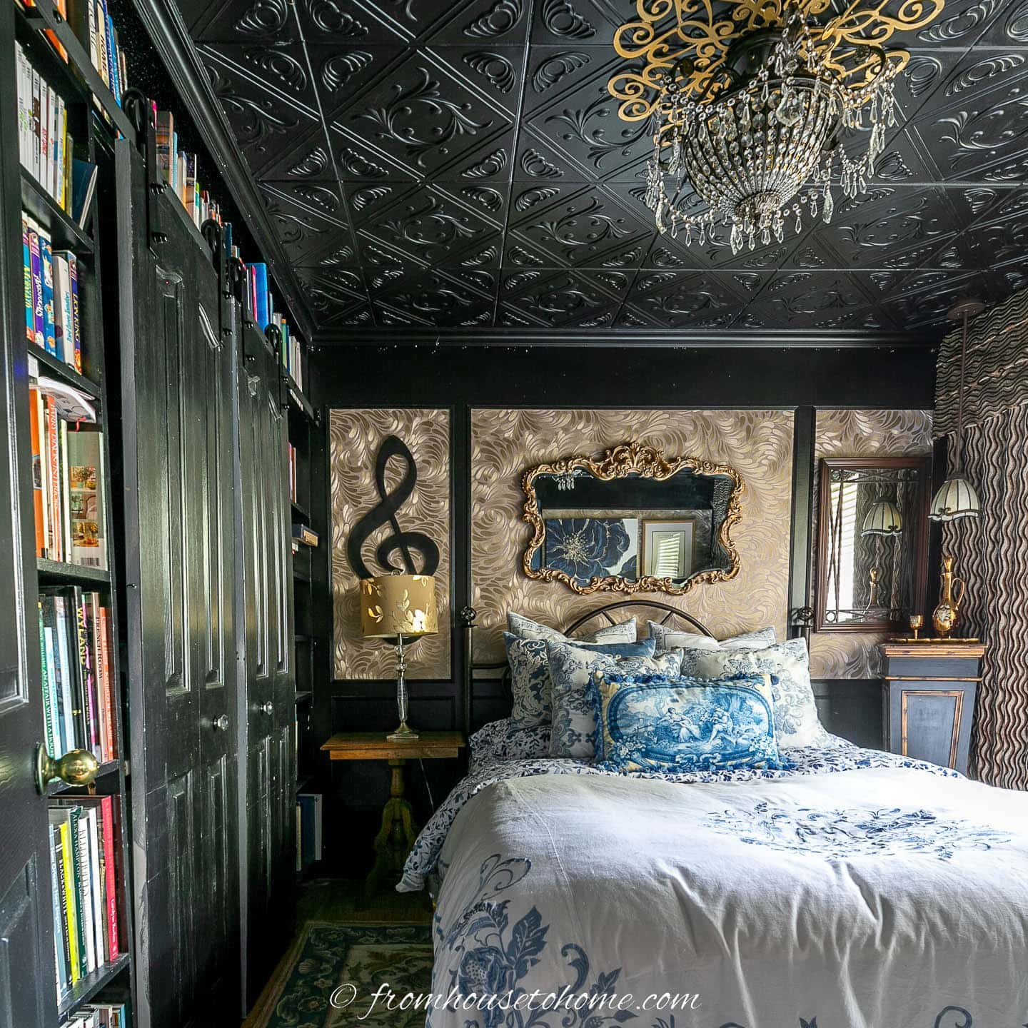 guest bedroom with black ceiling and walls