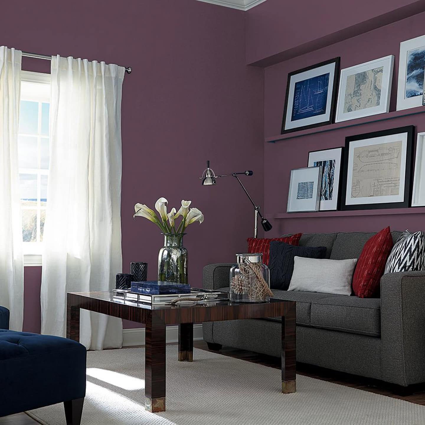 A living room painted in Glidden 2025 color of the year "Purple Basil"