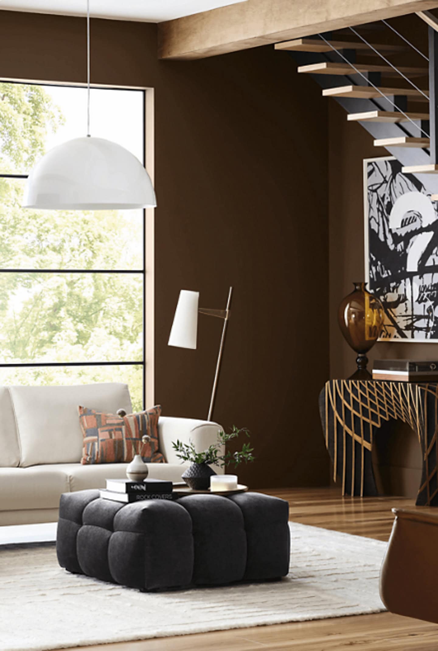 A living room painted with Sherwin Williams color of the year "Grounded"