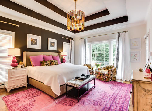 An Art Deco style bedroom with black and white on the walls and ceiling, and leopard print accents