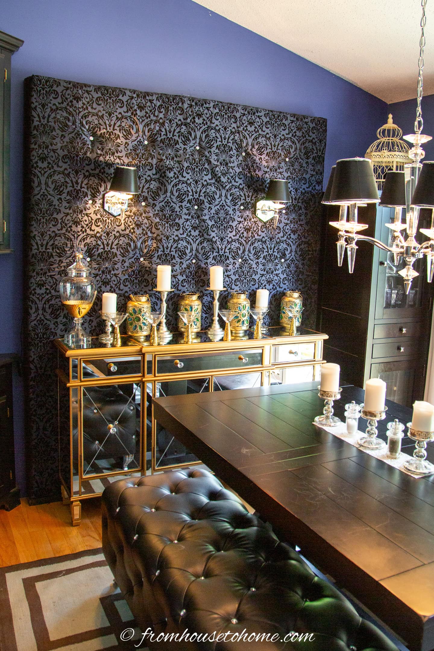 an upholstered backdrop as the focal point for an open concept dining room