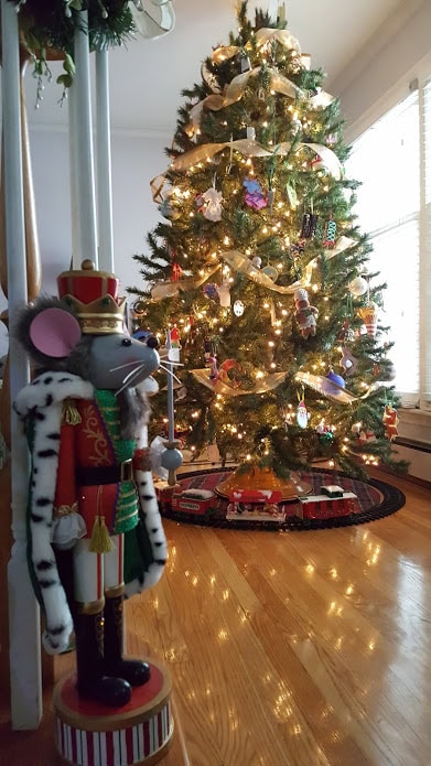 traditional christmas tree and rotating tree stand