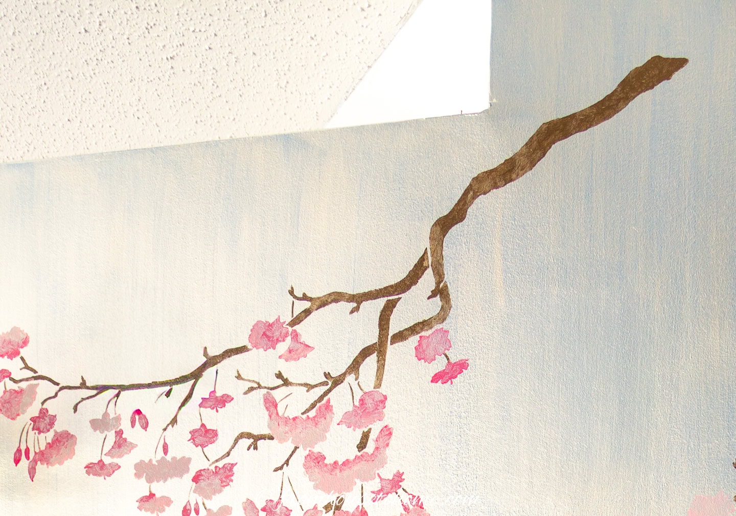 Close up of the branch on a DIY Chinoiserie wall