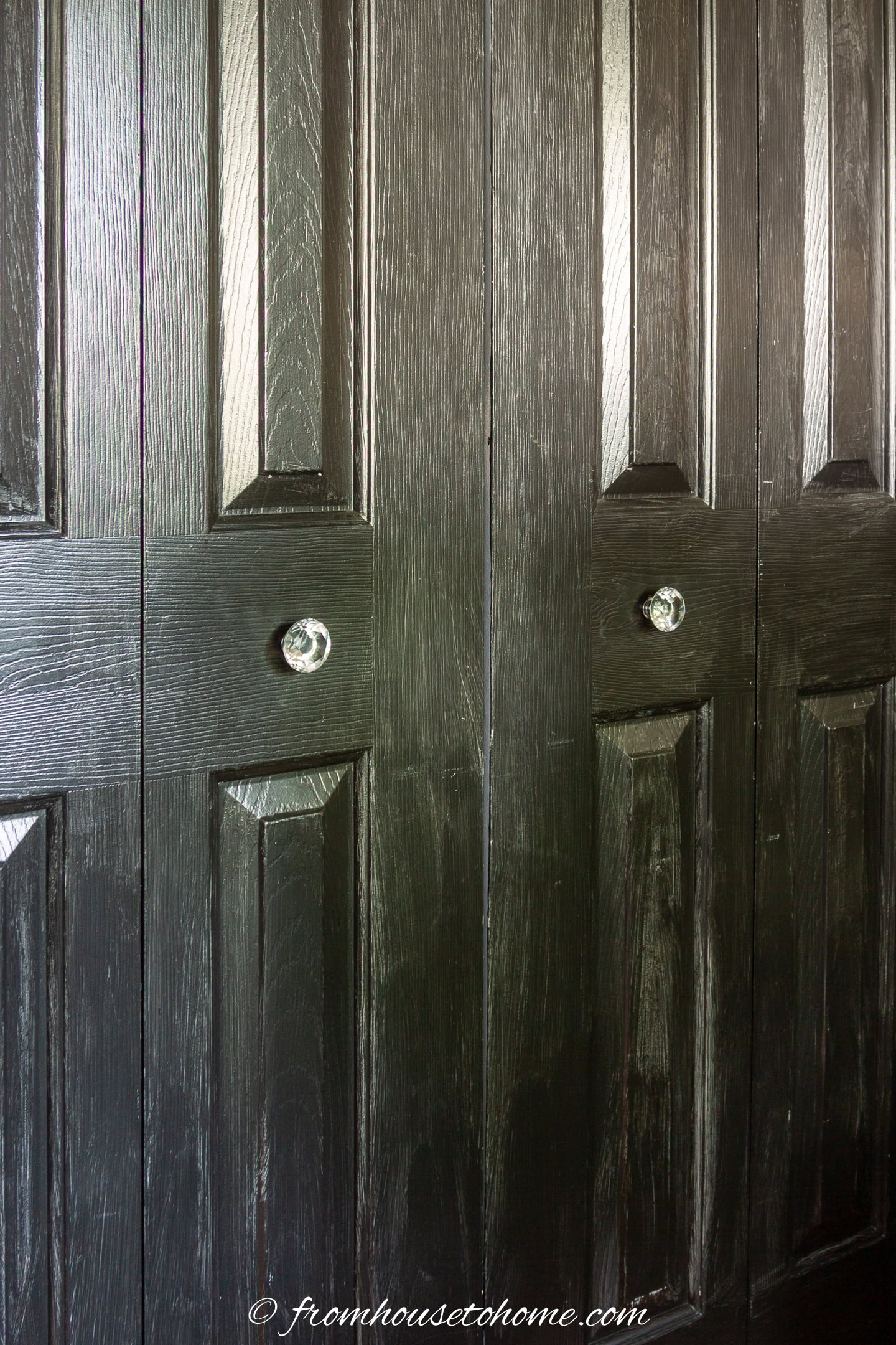 black closet doors with crystal door knobs
