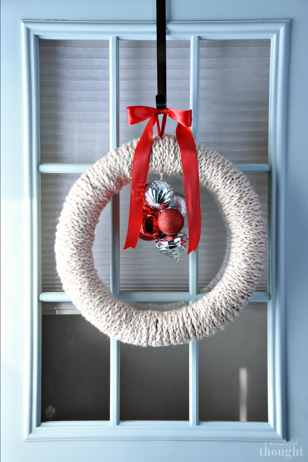 finger knitted christmas wreath