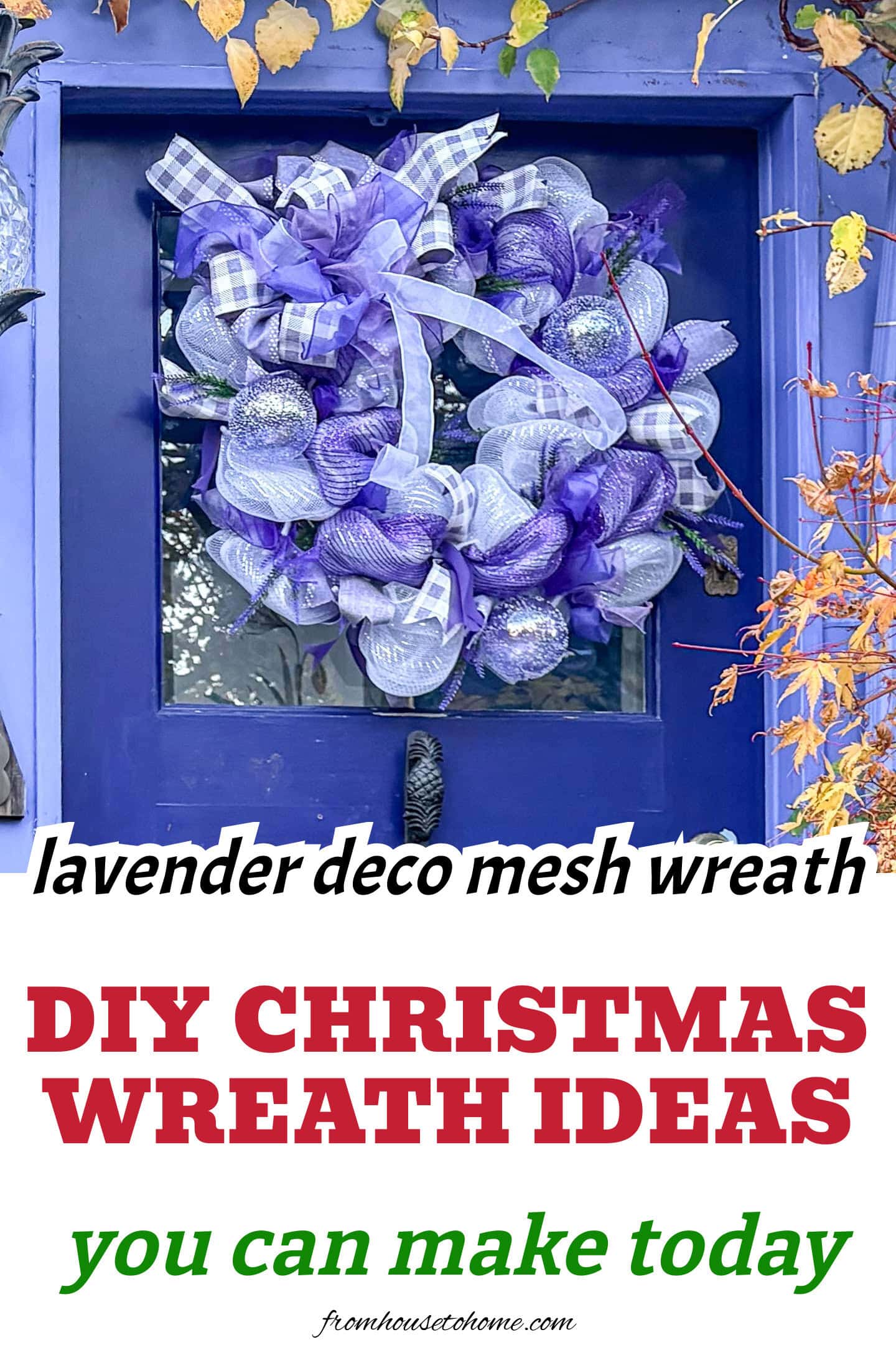 Close up of a DIY lavender and white deco mesh poof wreath hanging on a purple front door