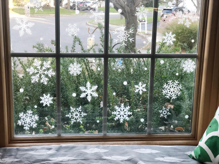 how to decorate a snowy christmas window