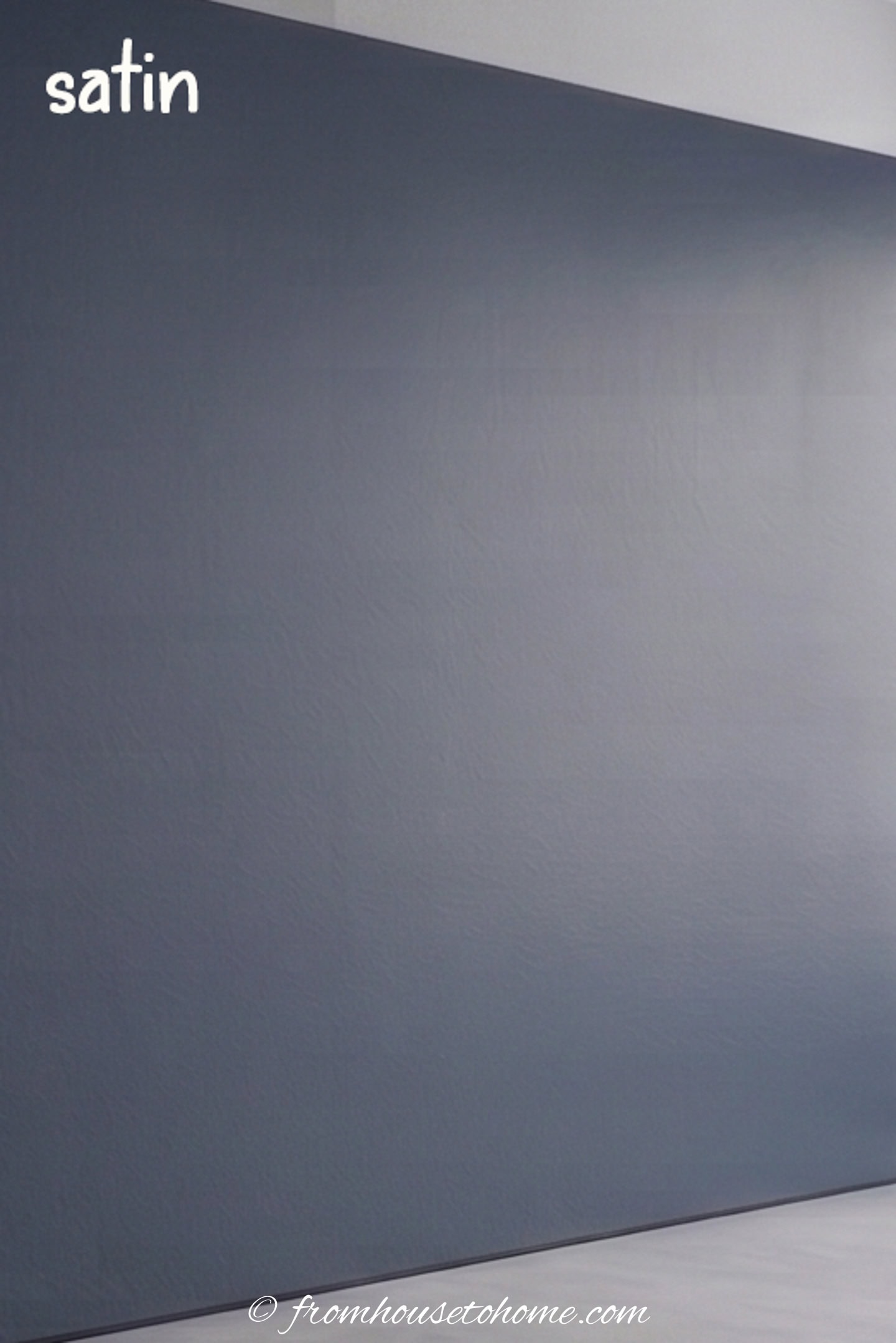 A wall painted in blue satin paint