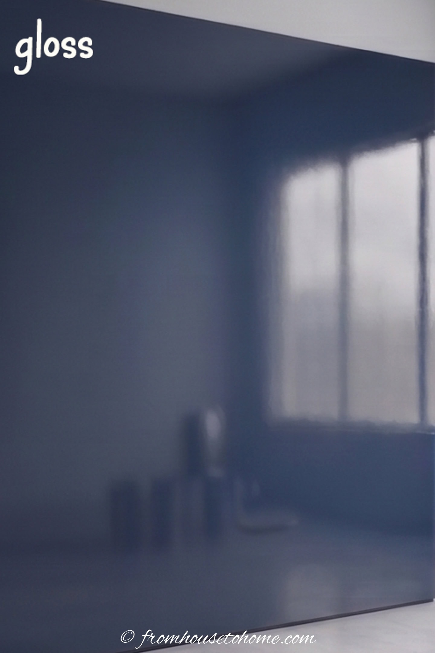 A wall painted in blue gloss paint