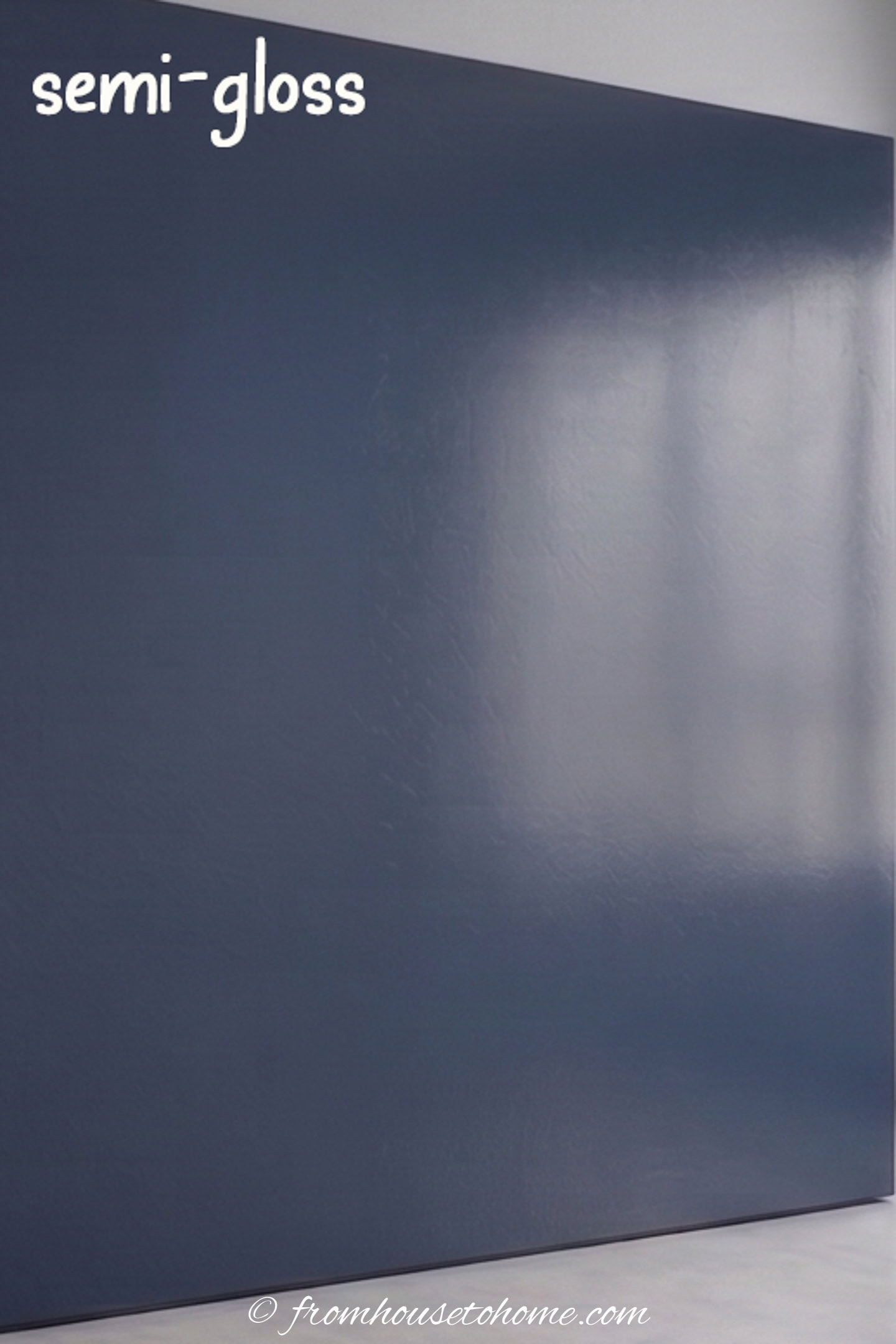 A wall painted in blue semi-gloss paint