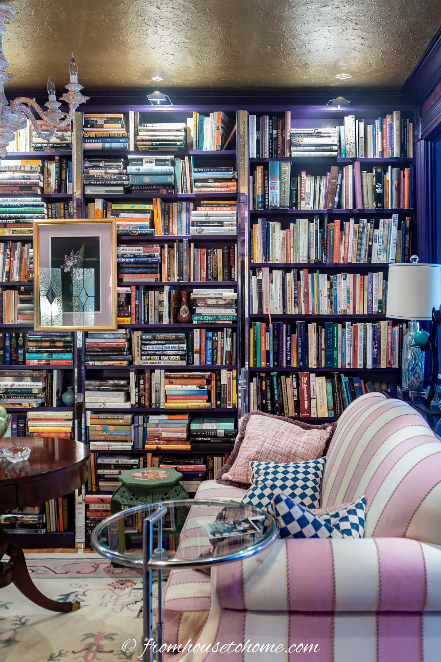 accent lights installed over a bookcase