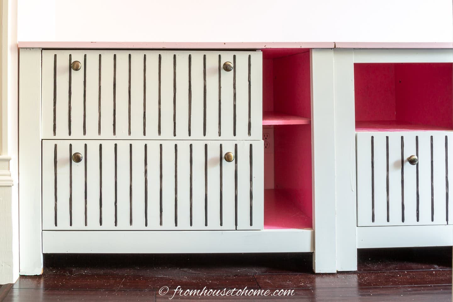 Home office filing cabinets painted white with a blush pink top, hot pink insides and black pinstripes on the drawers