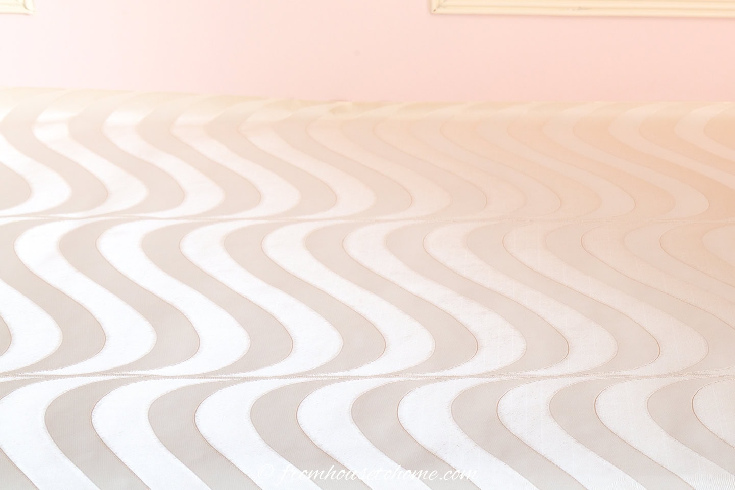 A section of wallpaper after it has been glued to the top of the countertop