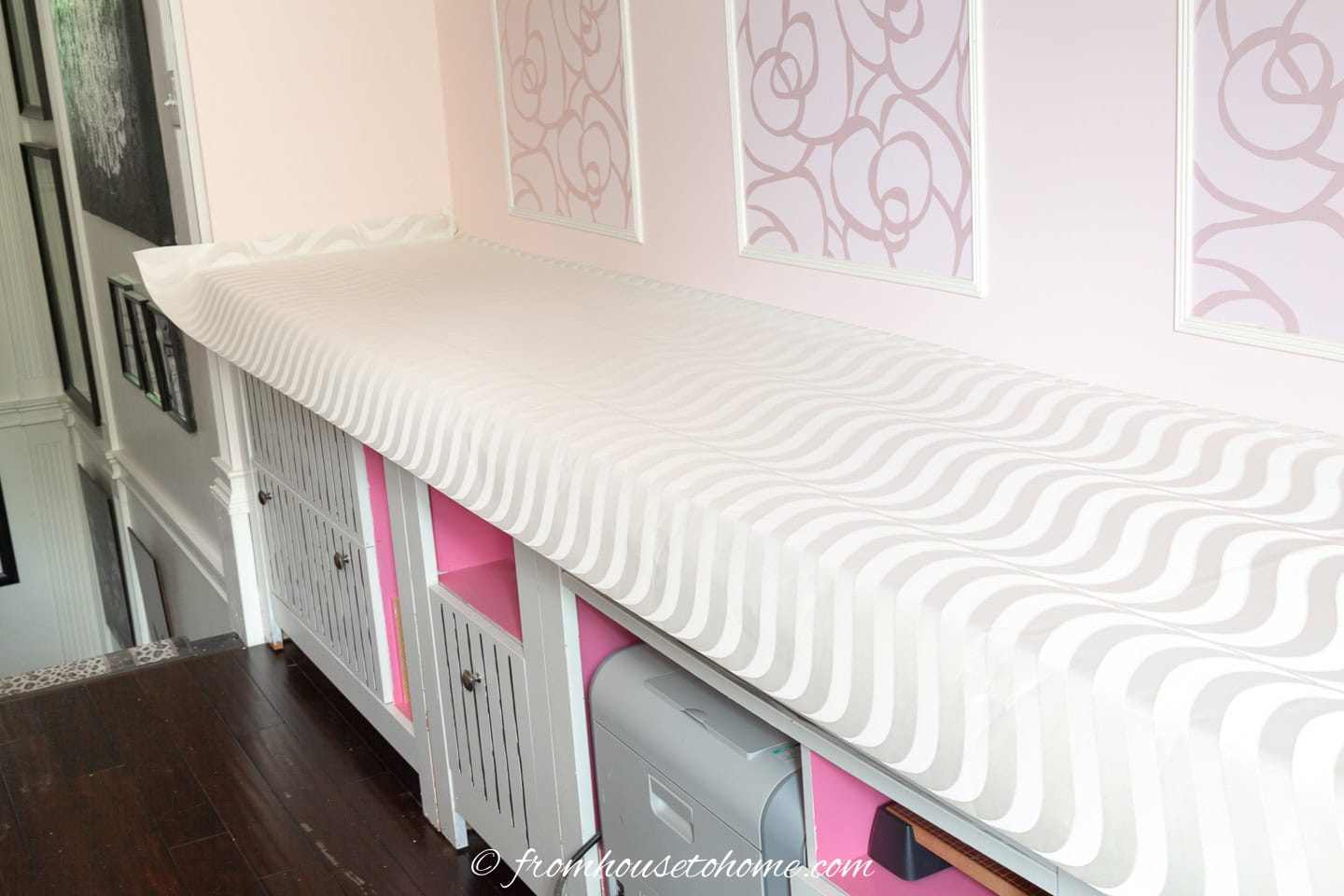 A countertop with wallpaper glued to the top