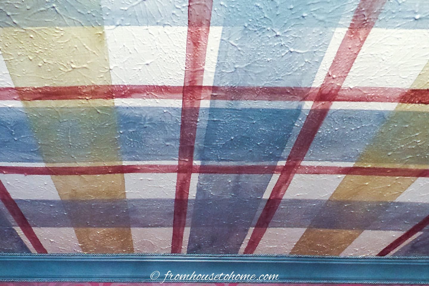 Close up of a plaid pattern painted on the ceiling