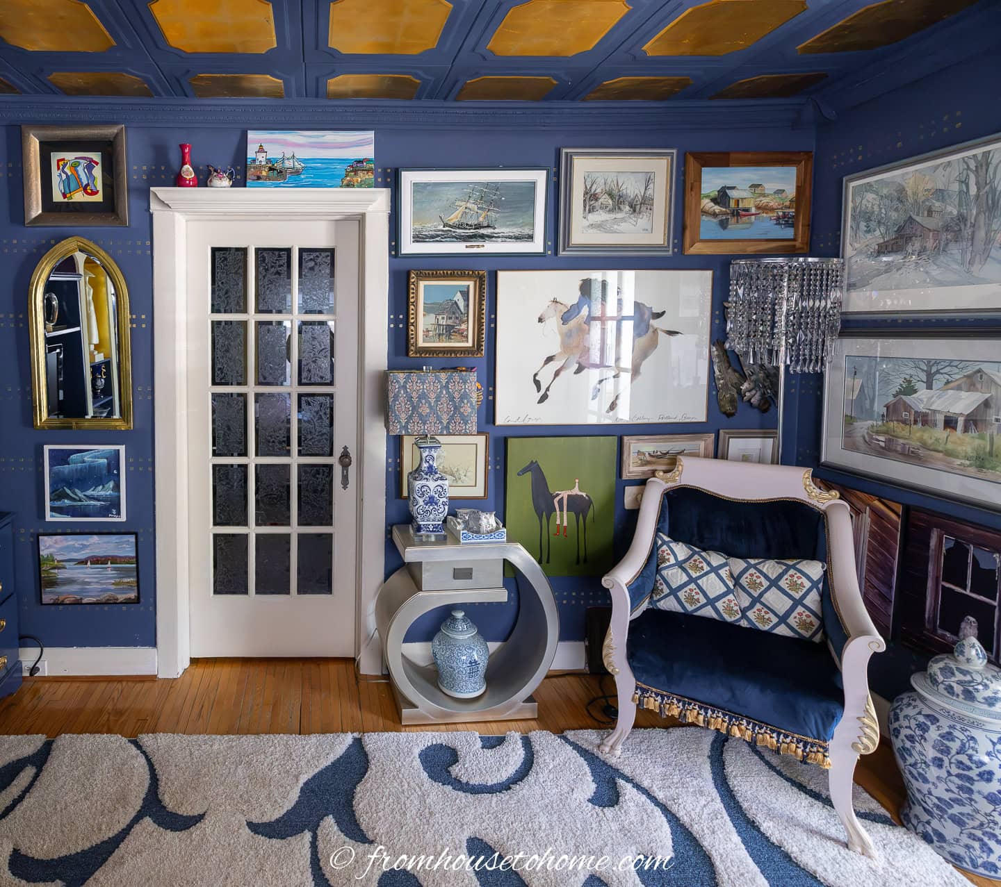 a living room gallery wall with all of the pictures using a nature theme