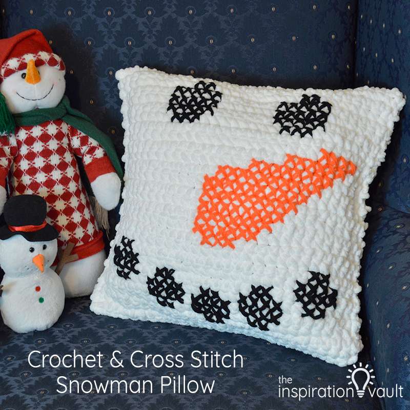 crochet and cross stitch snowman pillow