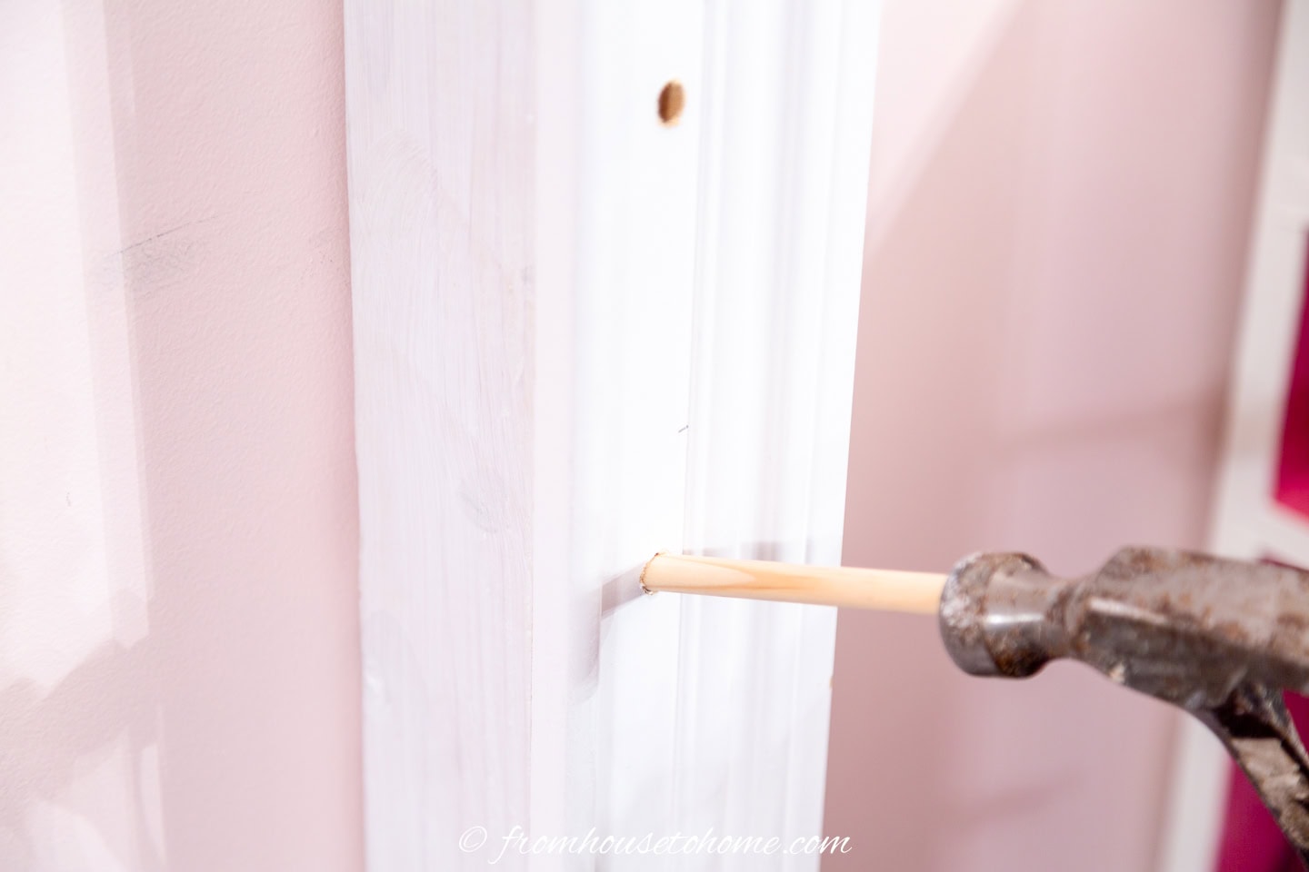 Use a hammer to push the dowels in