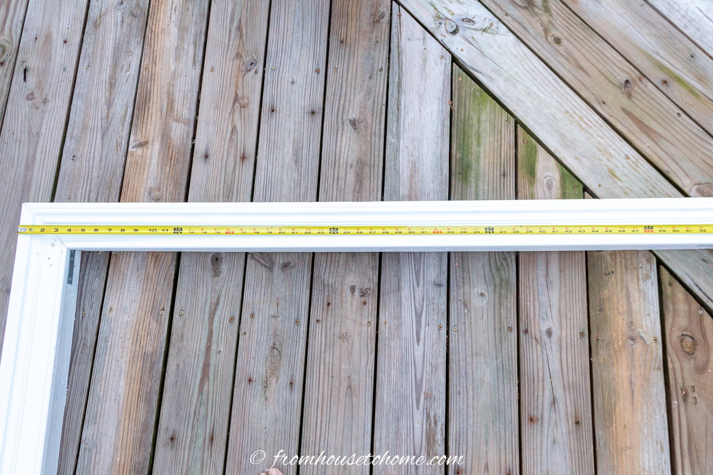 Measure from the bottom of the frame