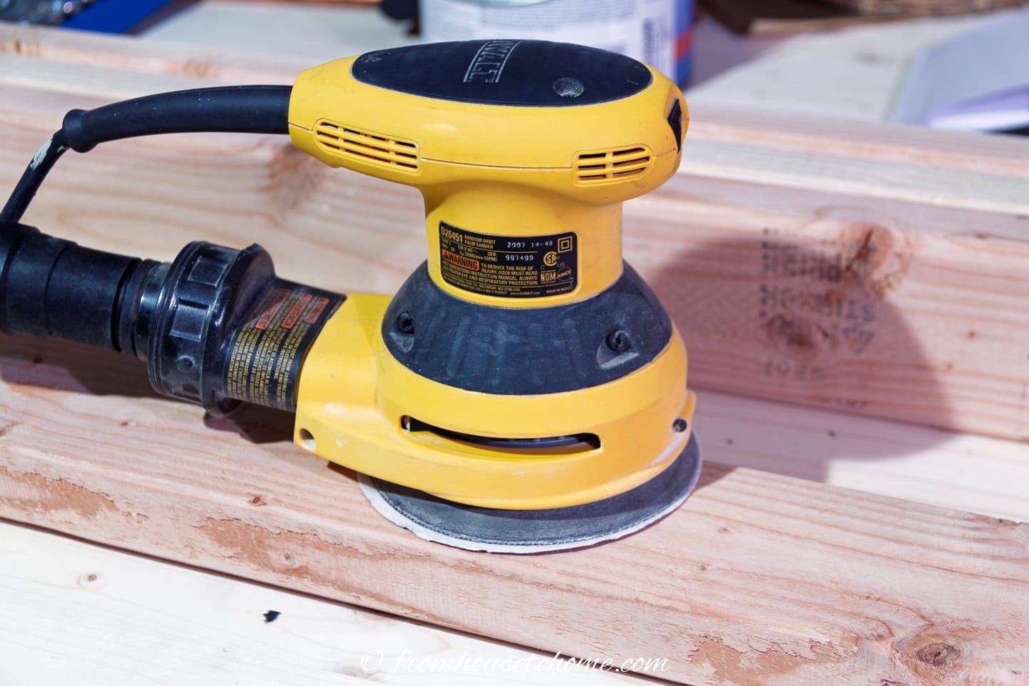 Use a rotary sander to smooth out the boards