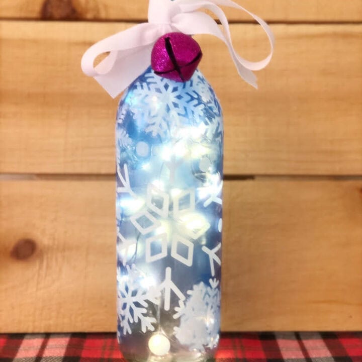 diy lighted snowflake wine bottle