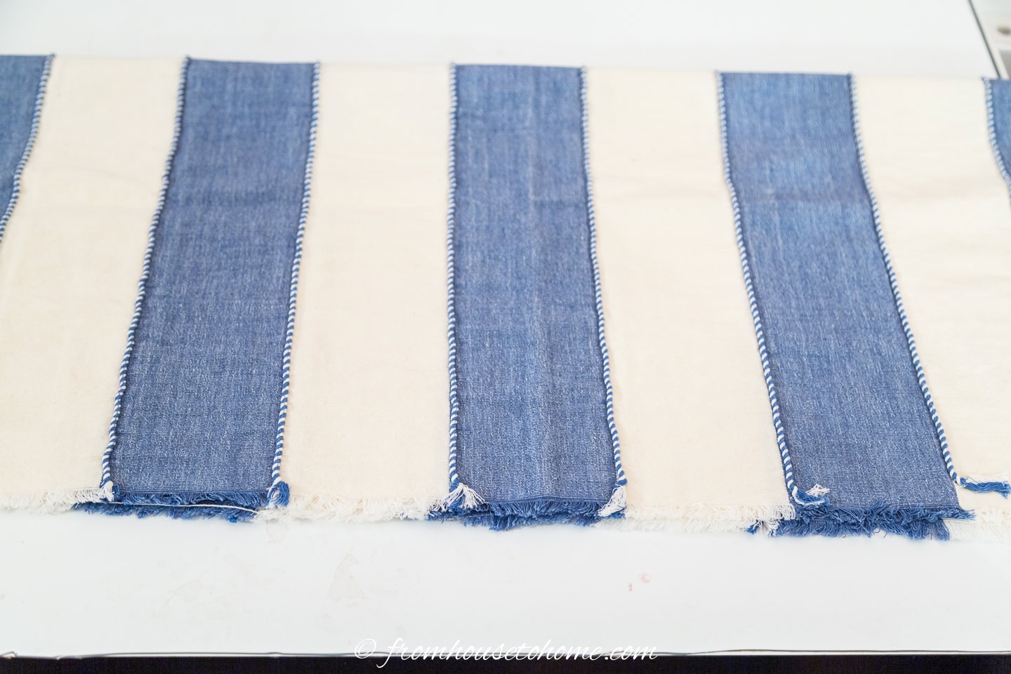 A folded piece of fabric laid out flat on a table