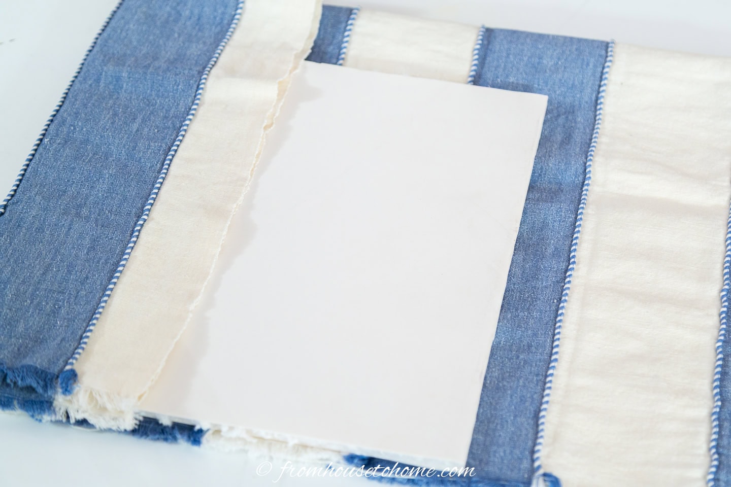 Line up fabric on the edge and fold the fabric over the top