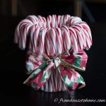 Tie a ribbon around the outside of the candy canes